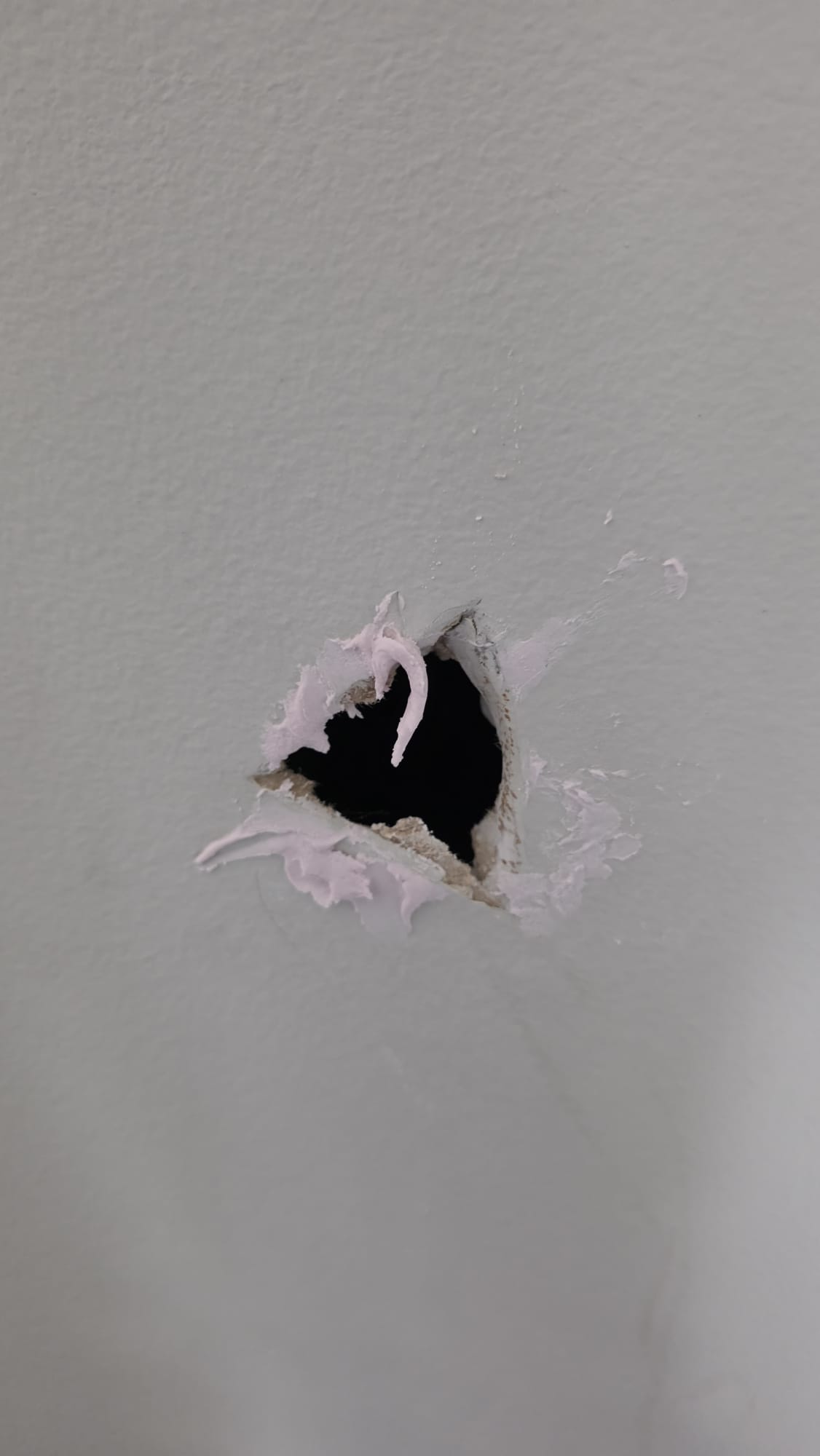 Drywall patch in progress by VanGo Services handyman